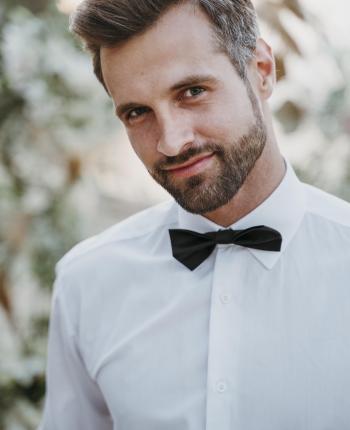 portrait-handsome-groom-his-beach-wedding